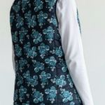 The North Face Flare 550 Blue Floral Flare Down Puffer Vest Photo 1