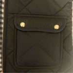 J.Crew Black Quilted Puffer Vest with Gold Accents, Pockets, & Gingham Lining Photo 3