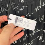 We Wore What NWT‎  Woman's Sz XS Black Sheer Flared Leg Logo Print Smocked Pants Photo 5