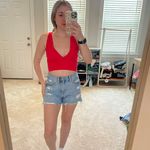 Out From Under Red Tank Photo 0