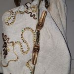 Purse. (B) Gold Photo 4