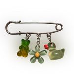 Silver Charm Safety Pin with Green and Yellow Accents Photo 0