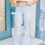 These Three Boutique Light Wash Flare Jeans Photo 0