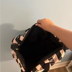 Victoria’s Secret light pink and black classic striped tote/duffle bag Photo 2