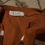 Texas Longhorns Orange women’s 47 crop T Photo 1