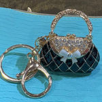 Source Unknown Elegant Black and Gold Keychain Bag Charm Photo 0