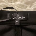 Lulus  Skirt size XS excellent condition long 13” and waist is 24” Photo 3