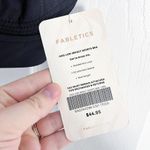 Fabletics Ines Low Impact Sports Bra in Coal Photo 4