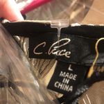 C. Luce  beautiful black and white dress Photo 8