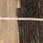 Tahari  pencil skirt.  Size: 12.  Small slit on back. Metallic thread throughout. Photo 7