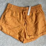 Burnt orange shorts. Size medium. Tags still on Photo 3