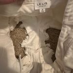 Le lis  White Jean Shorts with Distressed Hem and Studded Design Photo 2