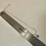 Silver tone blue cats eye dolphin pendant necklace Photo 5