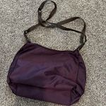 Chic Purple Crossbody Bag with Versatile Design Photo 3