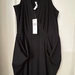 BCBGeneration  Black Jumpsuit with V-Neck and Defined Waist Photo 3