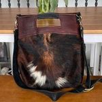 Stone Feather Road Custom Cowhide LeatherāBantam Bag Photo 0