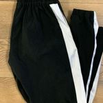 Askari Elastic waist pants, black with white side stripe Photo 0