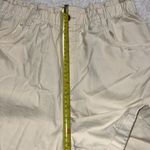 H&M  women's medium elastic waist shorts light yellow with pockets rolled hem Photo 1