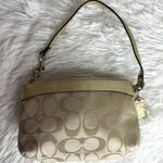 Coach Gold Tan Floral Signature Canvas Wristlet Photo 1
