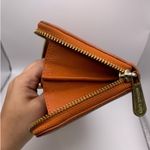 Michael Kors Burnt Orange Zip Around Wallet Photo 8