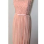 David's Bridal David’s bridal bridesmaid dress size 8 color is pink orange long with a slit Photo 0