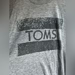 Toms Tom’s size large shirt Photo 1