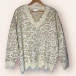Main Strip  boho cream/tan cheetah print distressed chunky sweater Photo 0