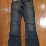 Silver Jeans Silver Lowrise Flare Jeans Womens Size 28 Slight Distress and Acid Wash Photo 0