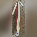 MCM  mini purse also comes with a crossbody strap Photo 3