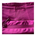 Lululemon Magenta color leggings, two side pockets, one back zip pocket, excellent condition Measurements: Waist: side to side 14-16 inches Inseam: 22 inches Photo 6