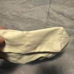 Perfectly Posh Cream and Pink Cosmetic Bag with Tassel Photo 1