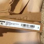 SKIMS Body Unlined Plunge Thong Bodysuit small clay NWT *dust marks* Photo 3