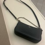 DKNY  Elegant Black Crossbody Bag with Gold Chain very light usage Photo 0