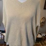 Umgee  cream colored v-neck lace up back long sleeve sweater. Photo 0