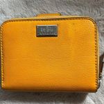 Coach Burnt Orange Leather Bi-Fold Wallet With Card Slots & ID Window Photo 0
