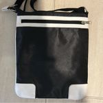 Disney ’s Crossbody bag featuring Mickey Mouse 9” x 11” Photo 0