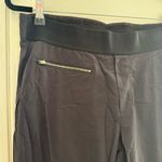 Athleta  Trekkie Crop Black Zippered Pull On Pants Size 12 Travel Athleisure Photo 4