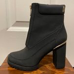 DKNY NWT Logan Lug Sole Boot Black With Gold Metal Detail Size 7 Photo 4