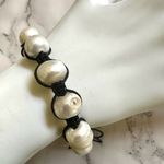 Pearl bracelet on adjustable black silk cord Photo 3