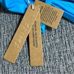 SKIMS  Swim High Neck Bikini Top Photo 8