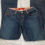 Level 99 flared leg darker denim jeans with rhinestone belt loops. Size 28 Photo 1