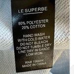 Le Superbe LUXURY White T Photo 3