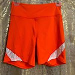 Free People Movement Space Race Orange Bike Shorts Medium NWOT Photo 0