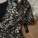 Lulus LULU’S Thrill Me Black And Gold Leopard Print Surplice Dress Photo 4