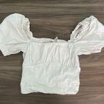 Divided White summer top with puff sleeves  Photo 0