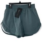 Alphalete NWT Porcelain Grey Compression Lined Stride Running Shorts Size SMALL Photo 3