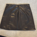 Divided mini leather skirt Photo 0