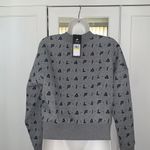 FILA NWT  All Over Logo Crop Crew Sweater Photo 1