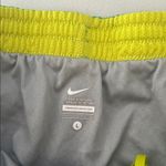 Nike  Women’s Size Large Green and Yellow Lightweight Performance Shorts Photo 1