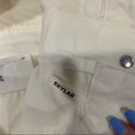 GRLFRND Skylar Bone Buckle Denim Jeans Photo 7